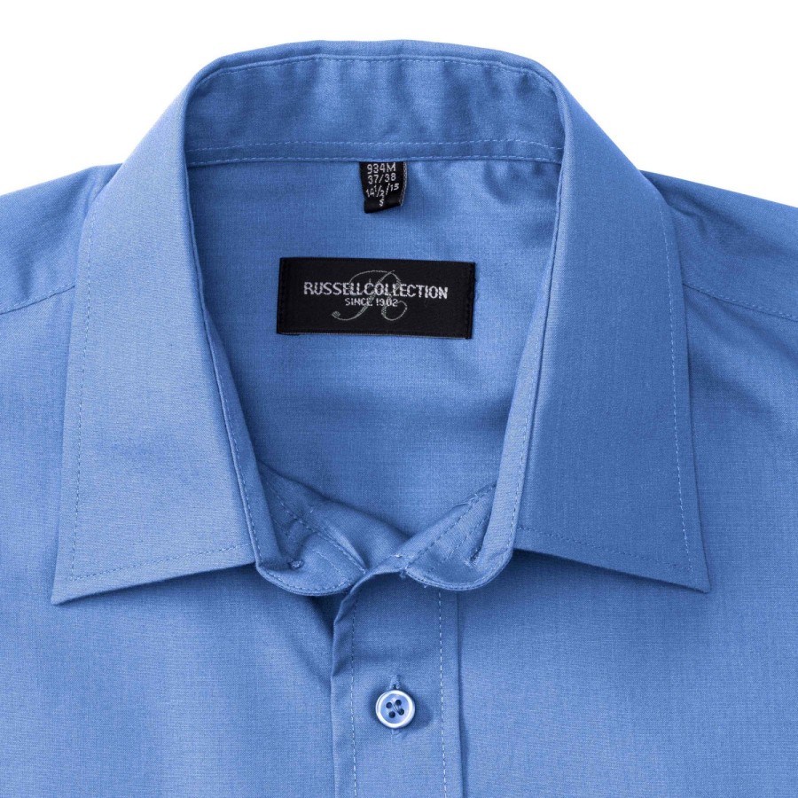 RUSSELL men's long sleeve shirt POLYCOTTON EASY CARE POPLIN.Elegant and versatile material.Classic, two buttons on cuff.35% Poplin cotton / 65% polyester, 110/105 g / m2.Drying at 50 degrees.EASY CARE -dry quickly , easily ironed white XS