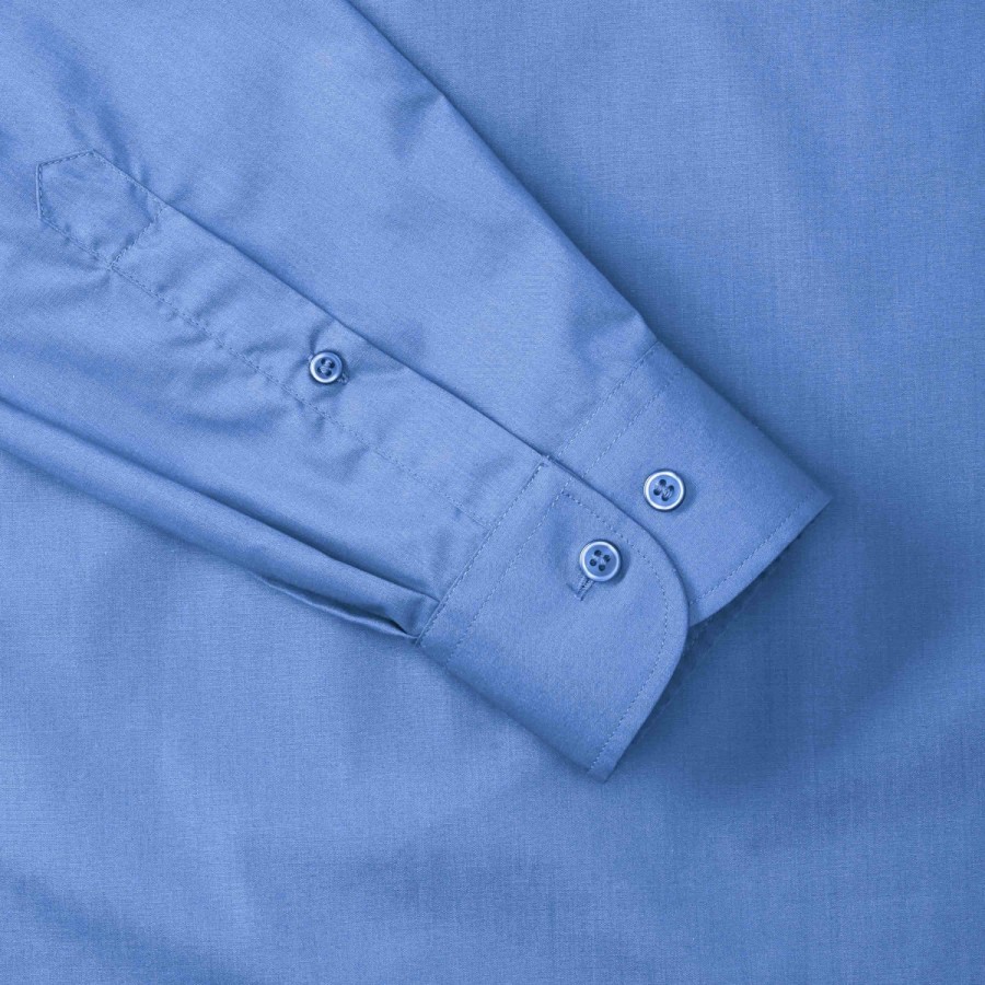 RUSSELL men's long sleeve shirt POLYCOTTON EASY CARE POPLIN.Elegant and versatile material.Classic, two buttons on cuff.35% Poplin cotton / 65% polyester, 110/105 g / m2.Drying at 50 degrees.EASY CARE -dry quickly , easily ironed white XS